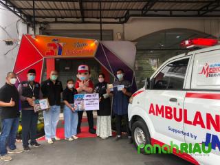 JNE Pekanbaru salurkan Sembako dan ambulans untuk Masyarakat